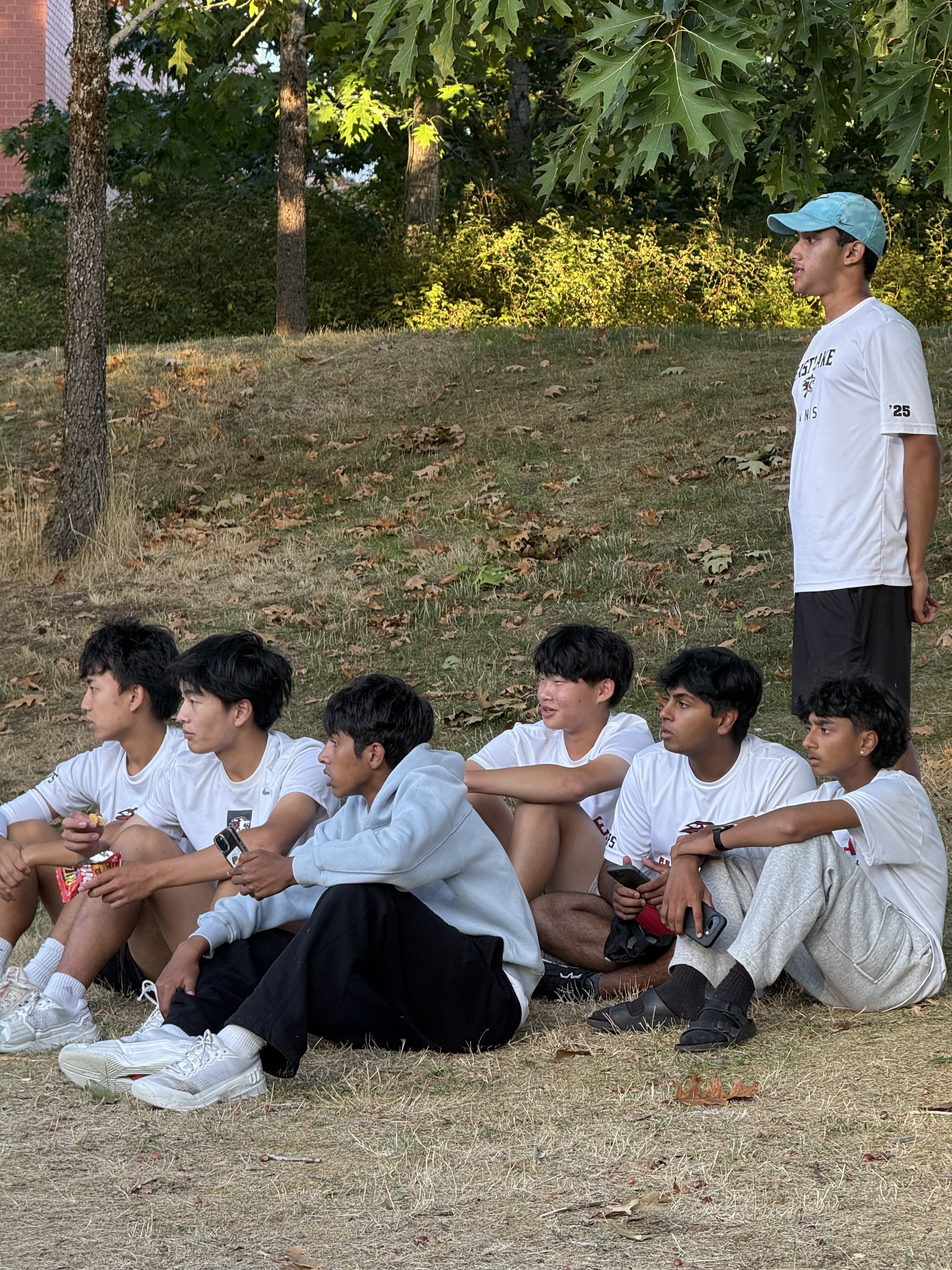 Eastlake Boys Tennis supporters cheering at Newport